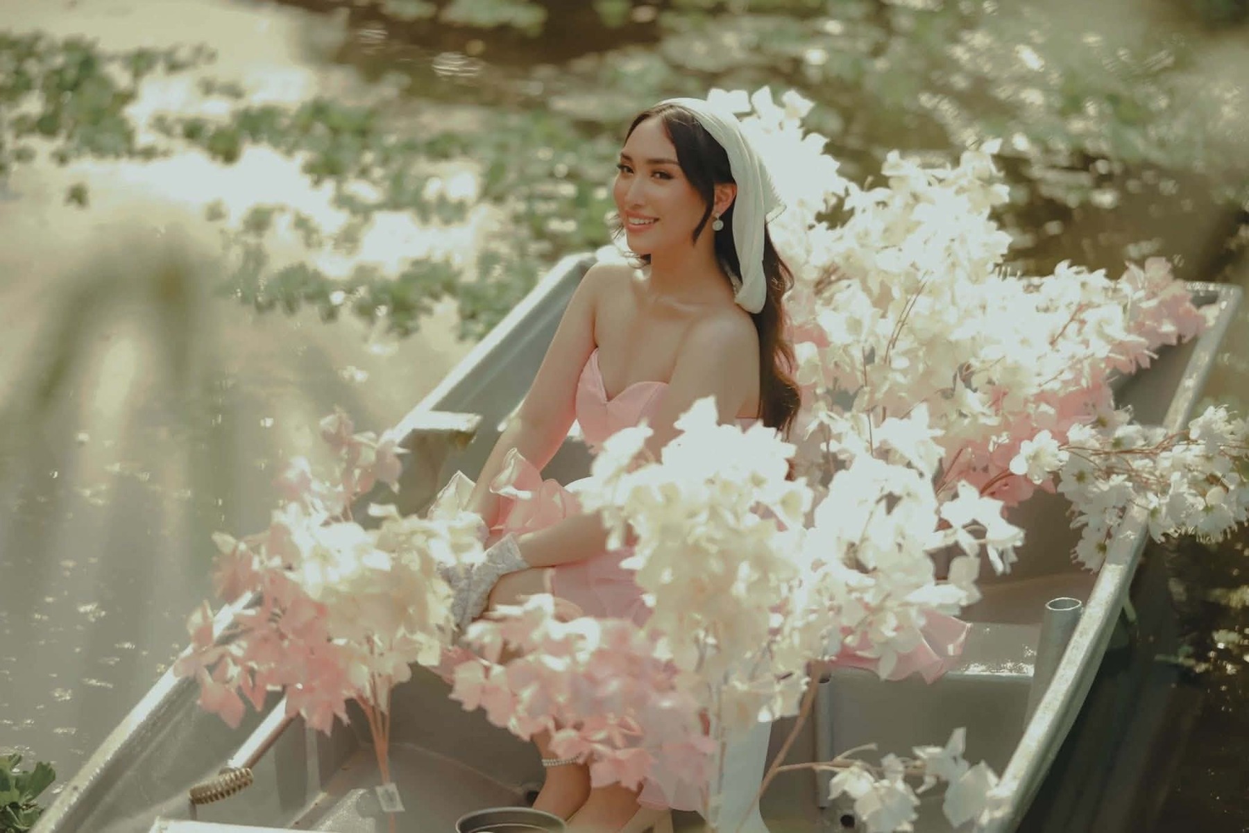 Shamira among soft garden flowers